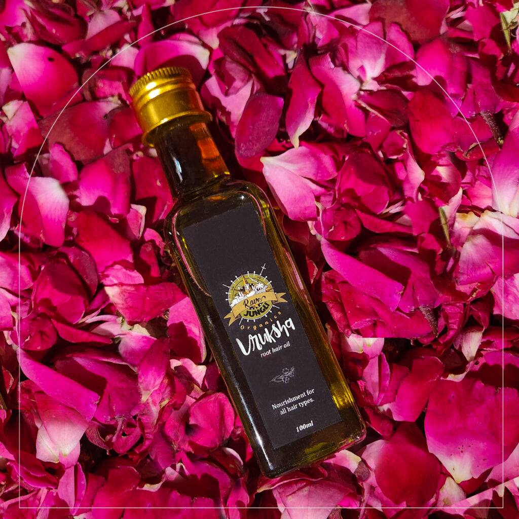 vruksha root hair oil on organic rose petals that are used to make this chemical free ayurvedic hair oil